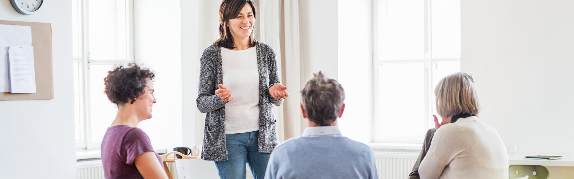 young woman standing while talking