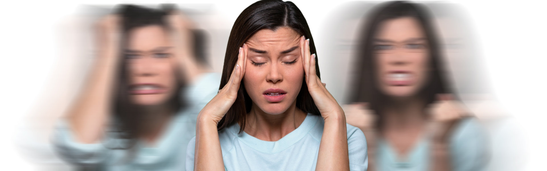 A woman with her hands on her head